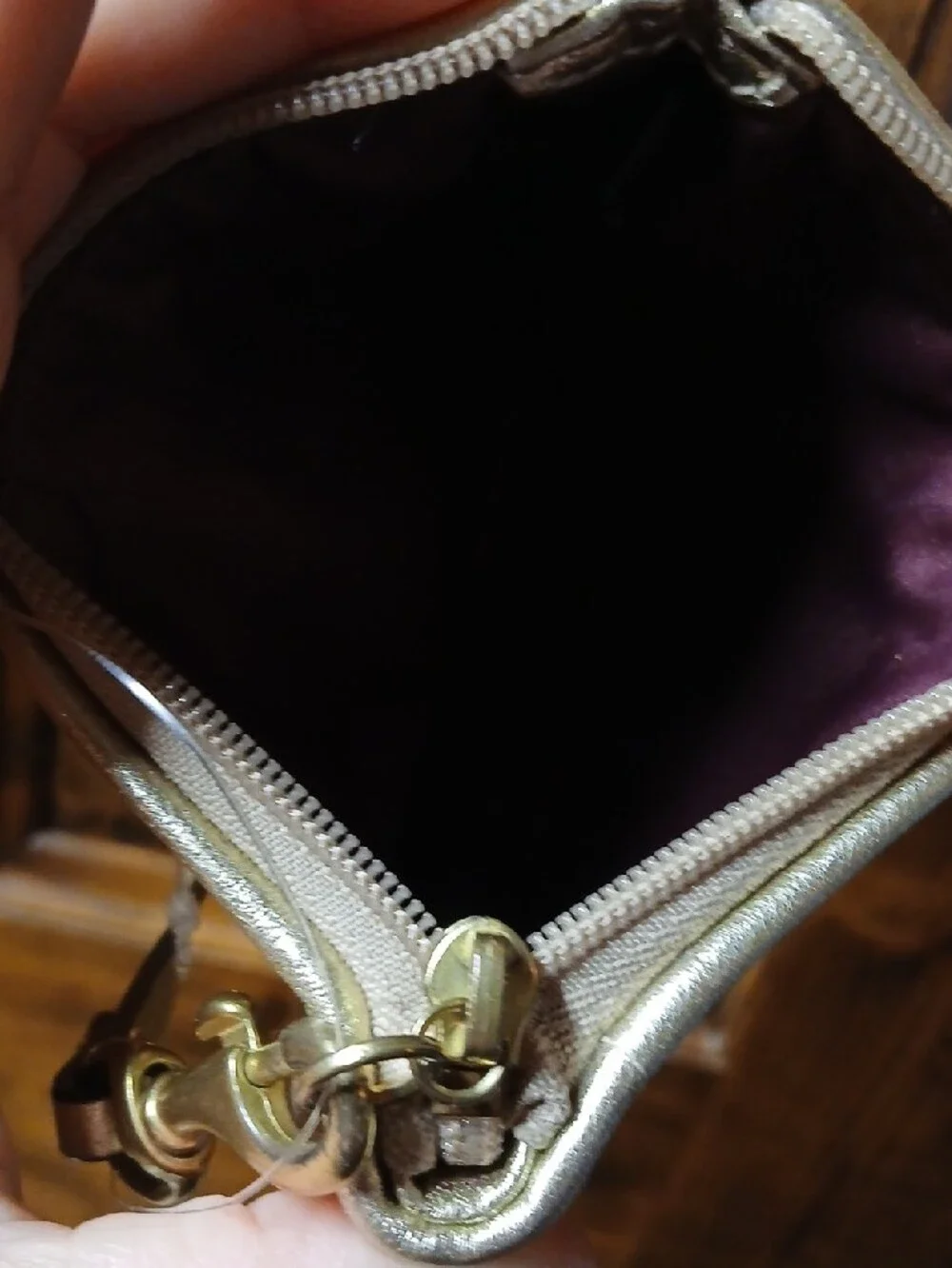 Coach Gold Signature Wristlet with Metallic Logo